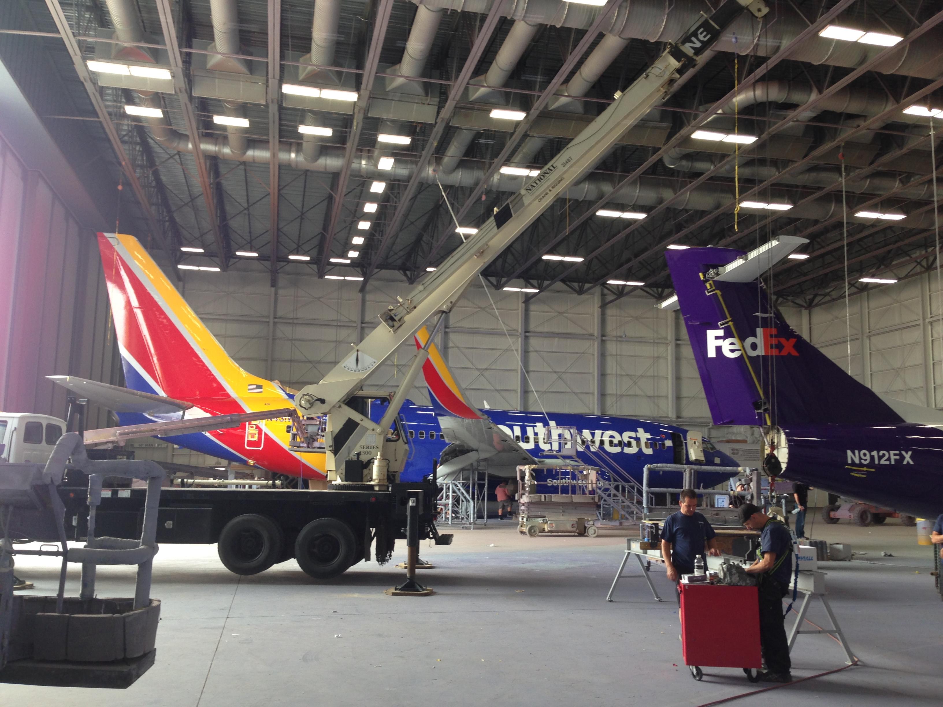 Working at an aerospace maintenance facility