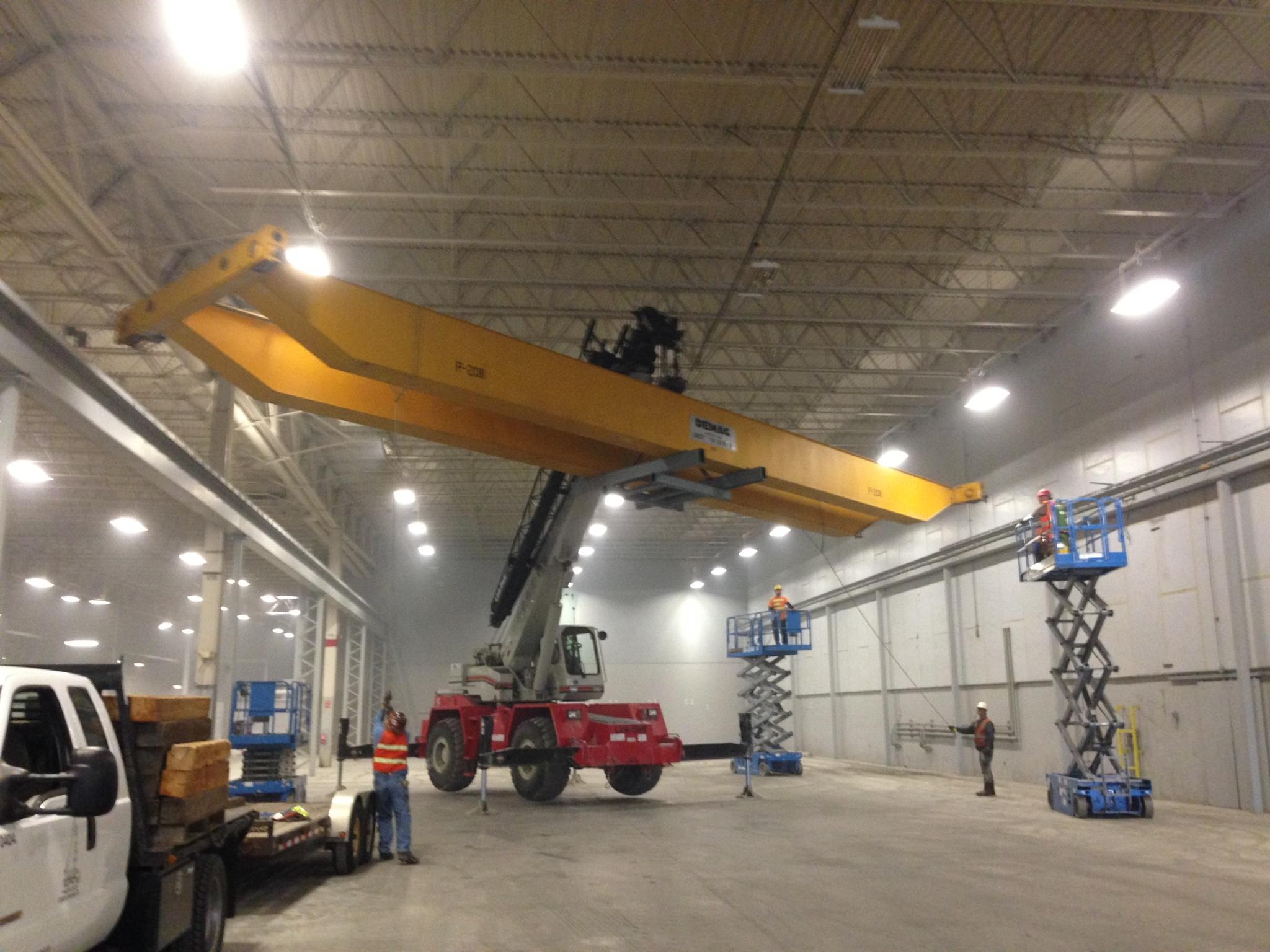 RT crane lifting a gantry crane