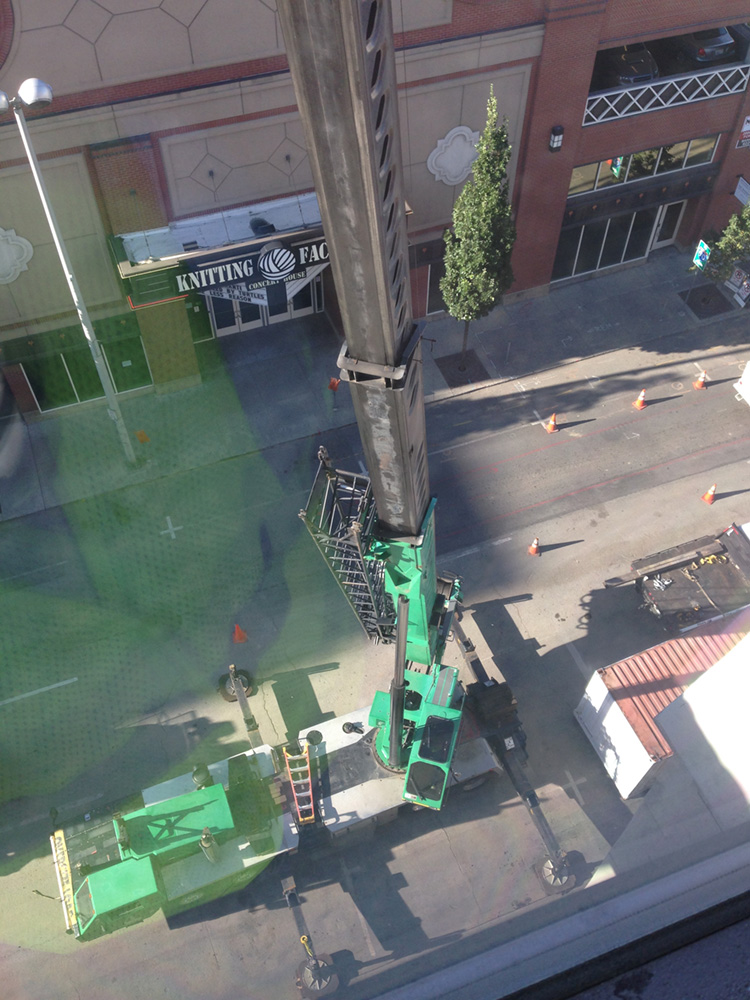 view from a certified rigger&rsquo;s perspective while they are guiding an operator placing materials into an upper story window
